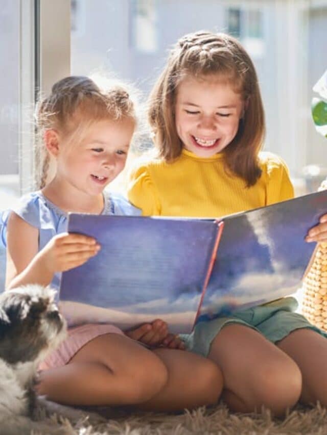 cropped-girls-are-reading-a-book-N4MYFTR-1.jpg