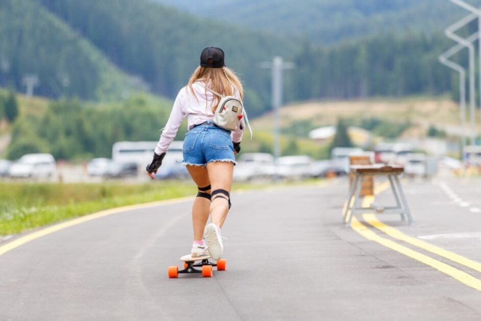 Riding A Street Surf Longboard